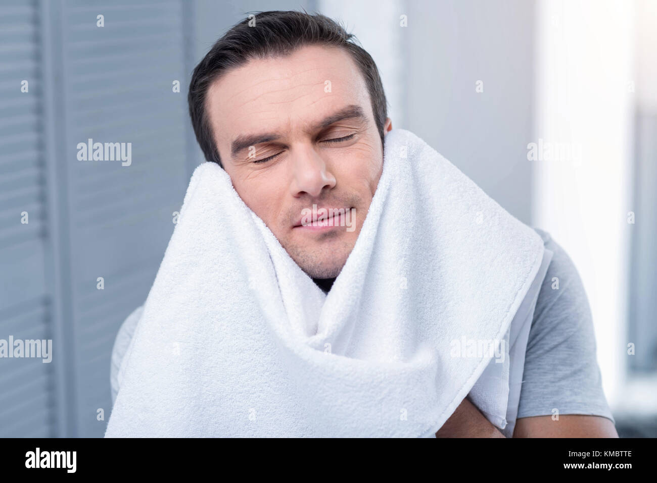 Pretty nice man relaxing after shower Stock Photo Alamy
