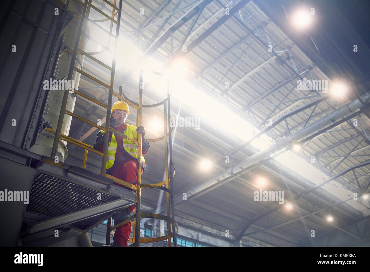 Steelworker on platform in steel mill Stock Photo