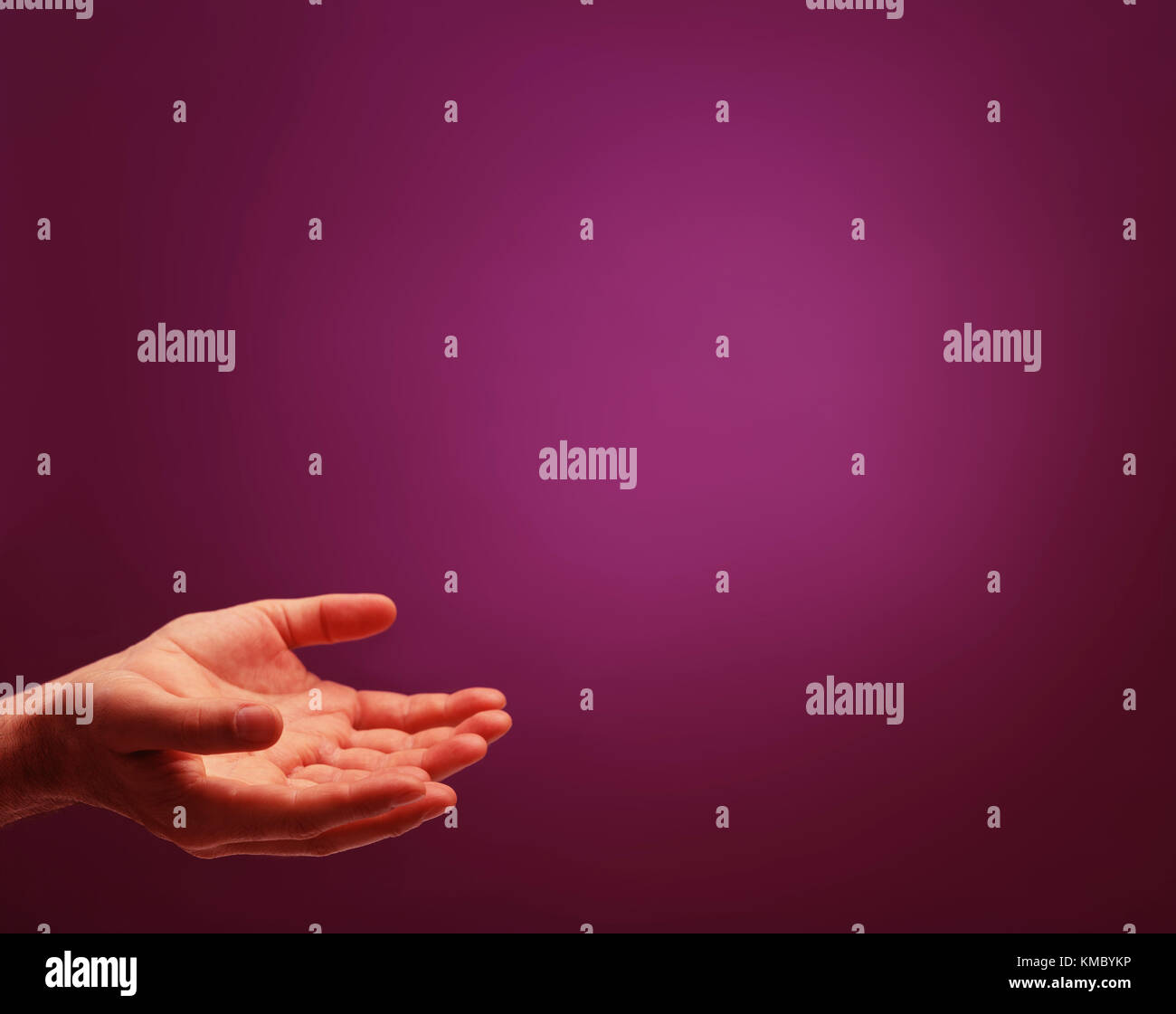 Cupped hands waiting to receive something with plenty of space for copy or illustrationbold hues Stock Photo