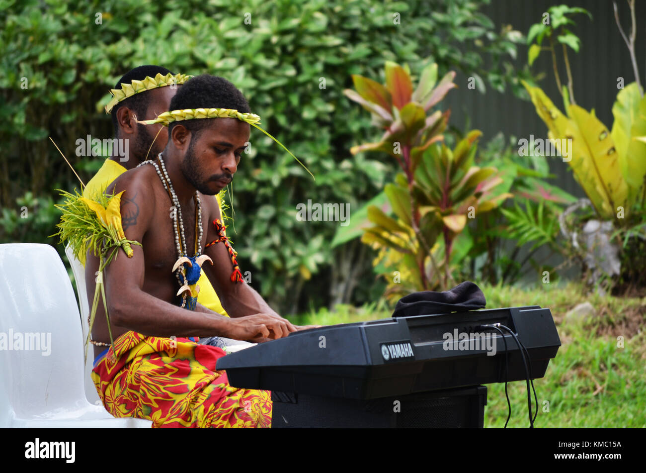Islanders singing and playing musical instruments taken at Papua New Guinea Stock Photo
