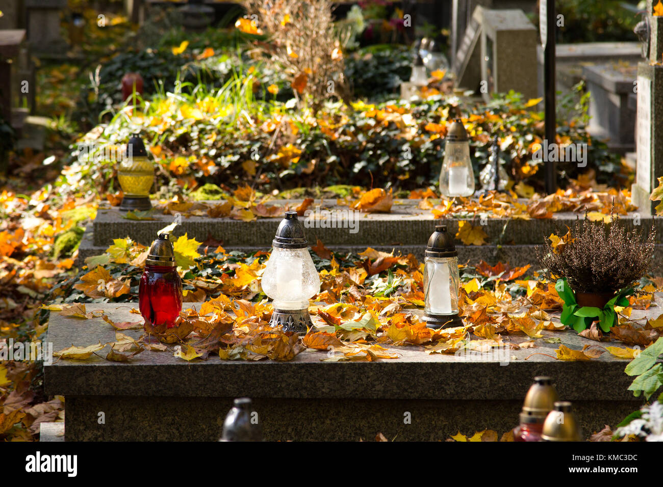 Graves Decorations Flowers And Votive Candles All Saints Day