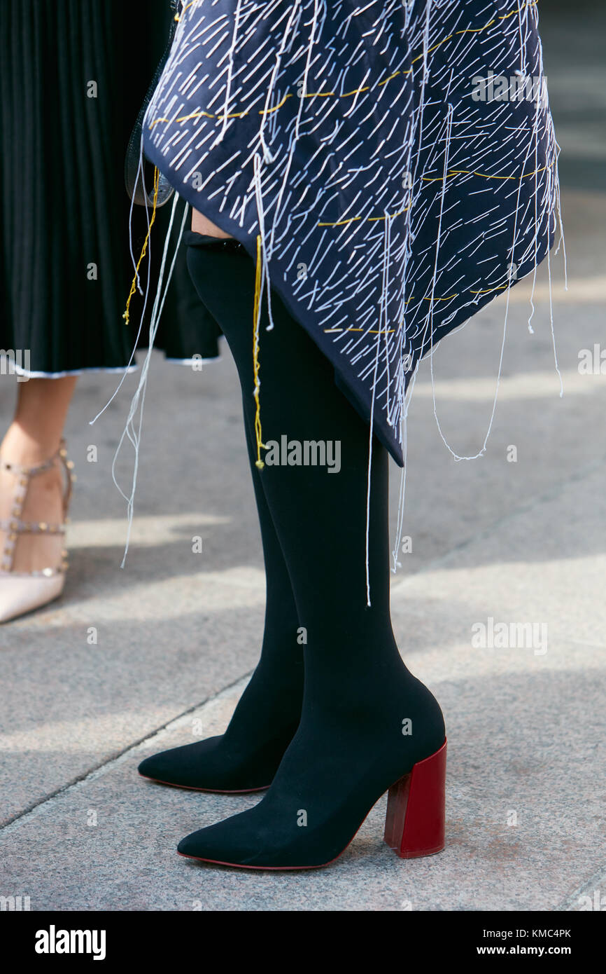 black boots with red heel