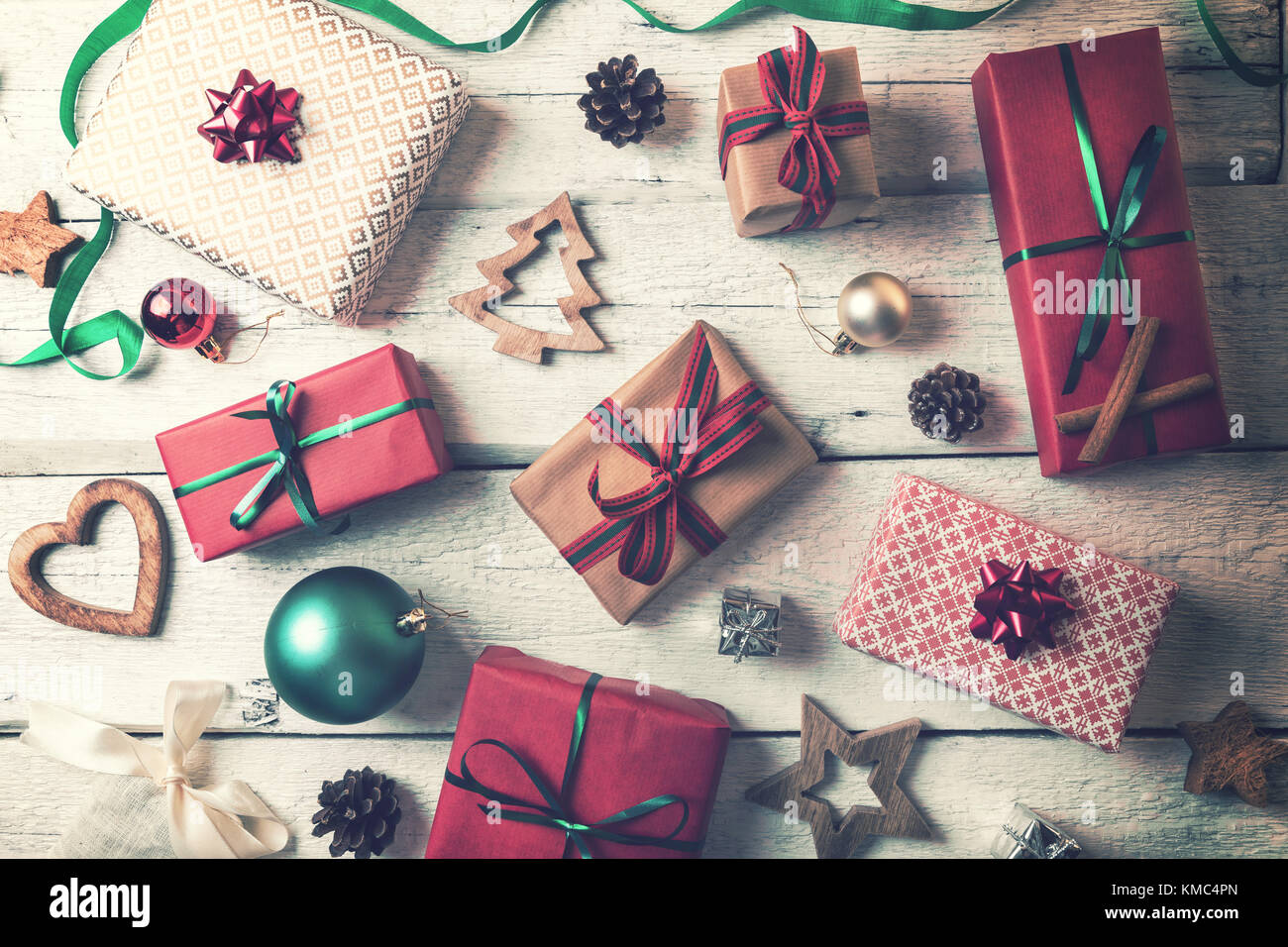 christmas gifts and decorations on white wooden background flat lay Stock Photo