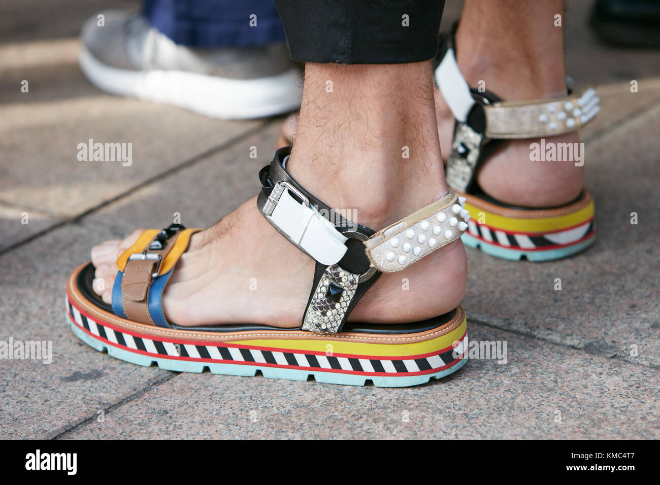 MILAN - SEPTEMBER 23: Man with colorful sandals before Gabriele Colangelo  fashion show, Milan Fashion Week street style on September 23, 2017 in  Milan Stock Photo - Alamy