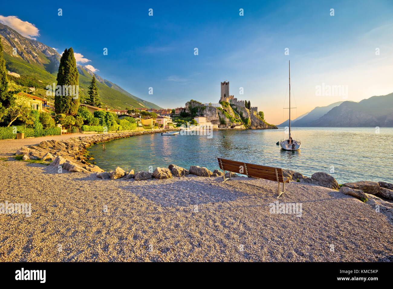 Town of Malcesine castle and beach view, Veneto region of Italy, Lago di Garda Stock Photo