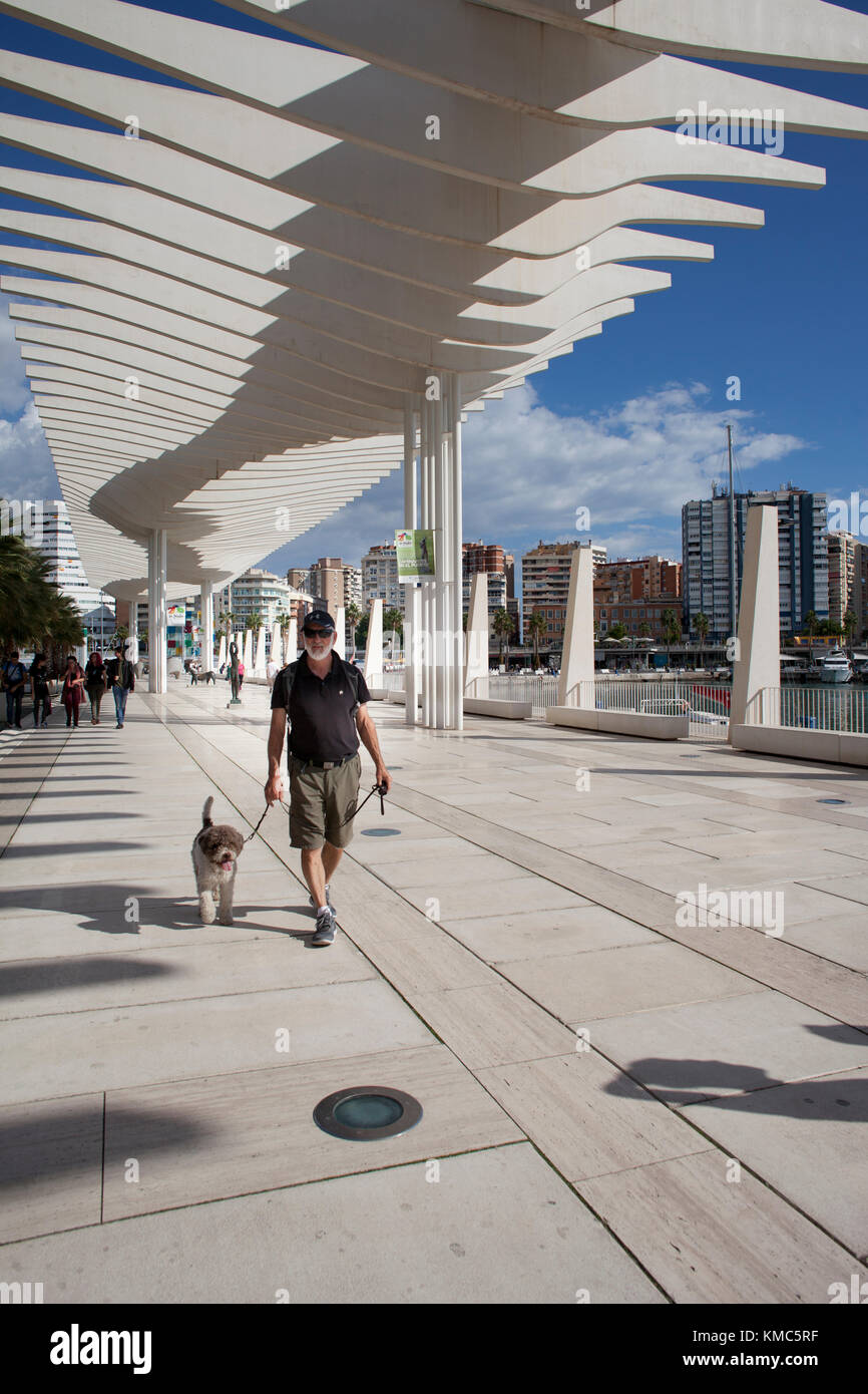 Walking the dog in Maliga,Spain Stock Photo