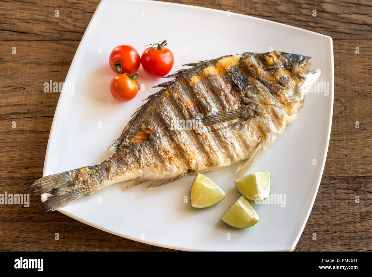 Grilled dorada fish Stock Photo - Alamy