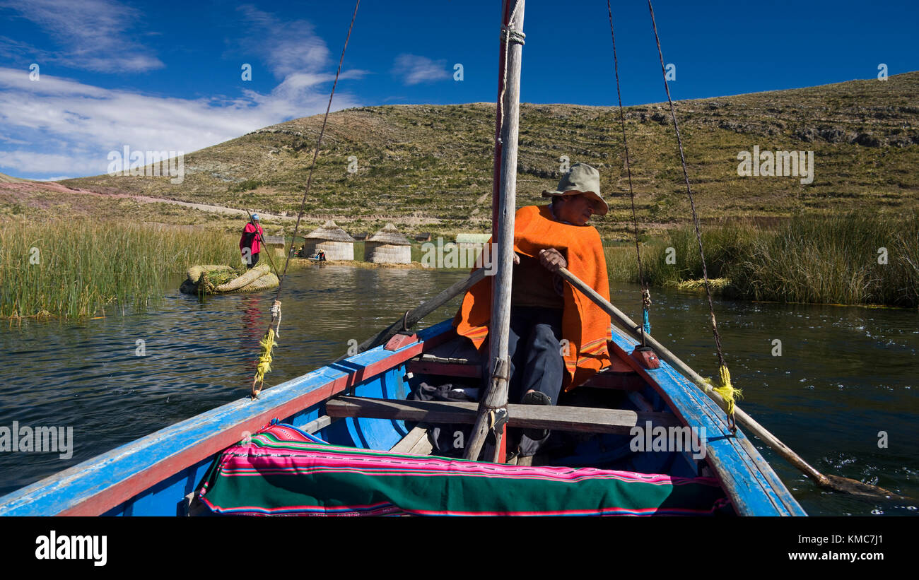 Traditional UrusIruitos reed village on the banks of Lake Titicaca in