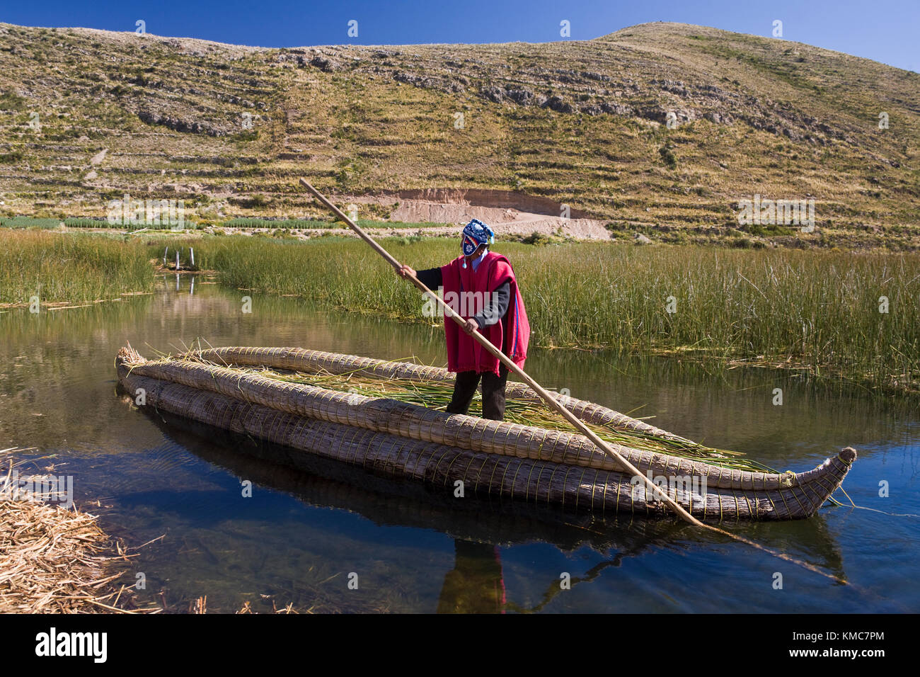 Traditional Urus-Iruitos reed boat on Lake Titicaca in Bolivia. The lake is on the border between Peru and Bolivia. At an altitude of 12,497 feet (3,8 Stock Photo