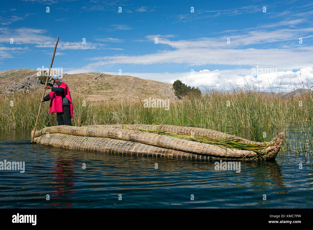 Traditional Urus-Iruitos reed boat on Lake Titicaca in Bolivia. The lake is on the border between Peru and Bolivia. At an altitude of 12,497 feet (3,8 Stock Photo