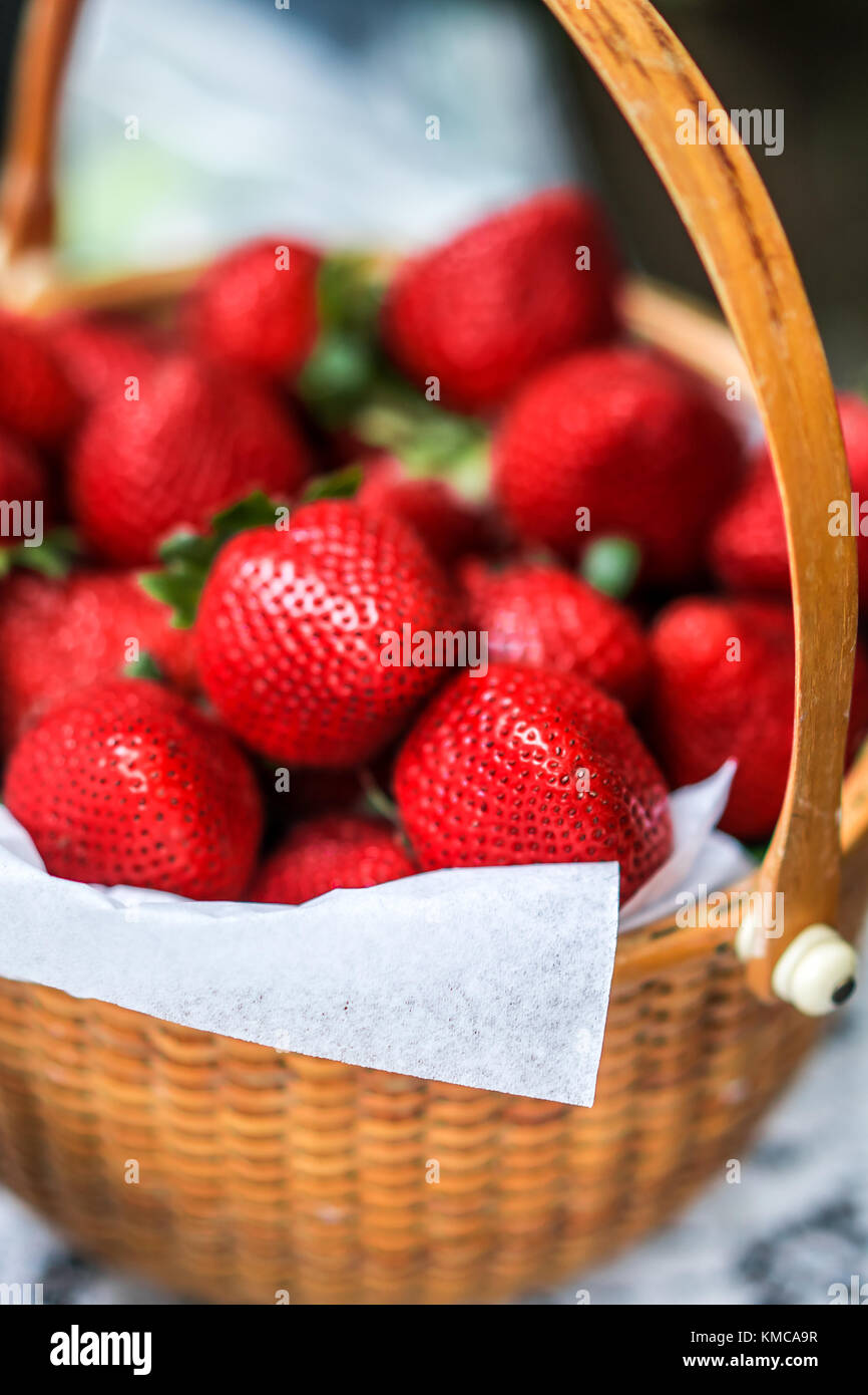 Fresh strawberries in a basket Stock Photo - Alamy
