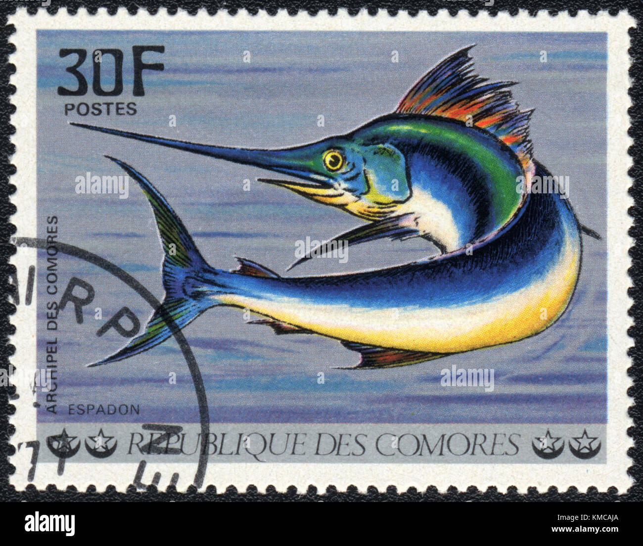 A stamp printed in COMOROS shows  a Espadon, series 'Tropical Fishes', circa 1977 Stock Photo