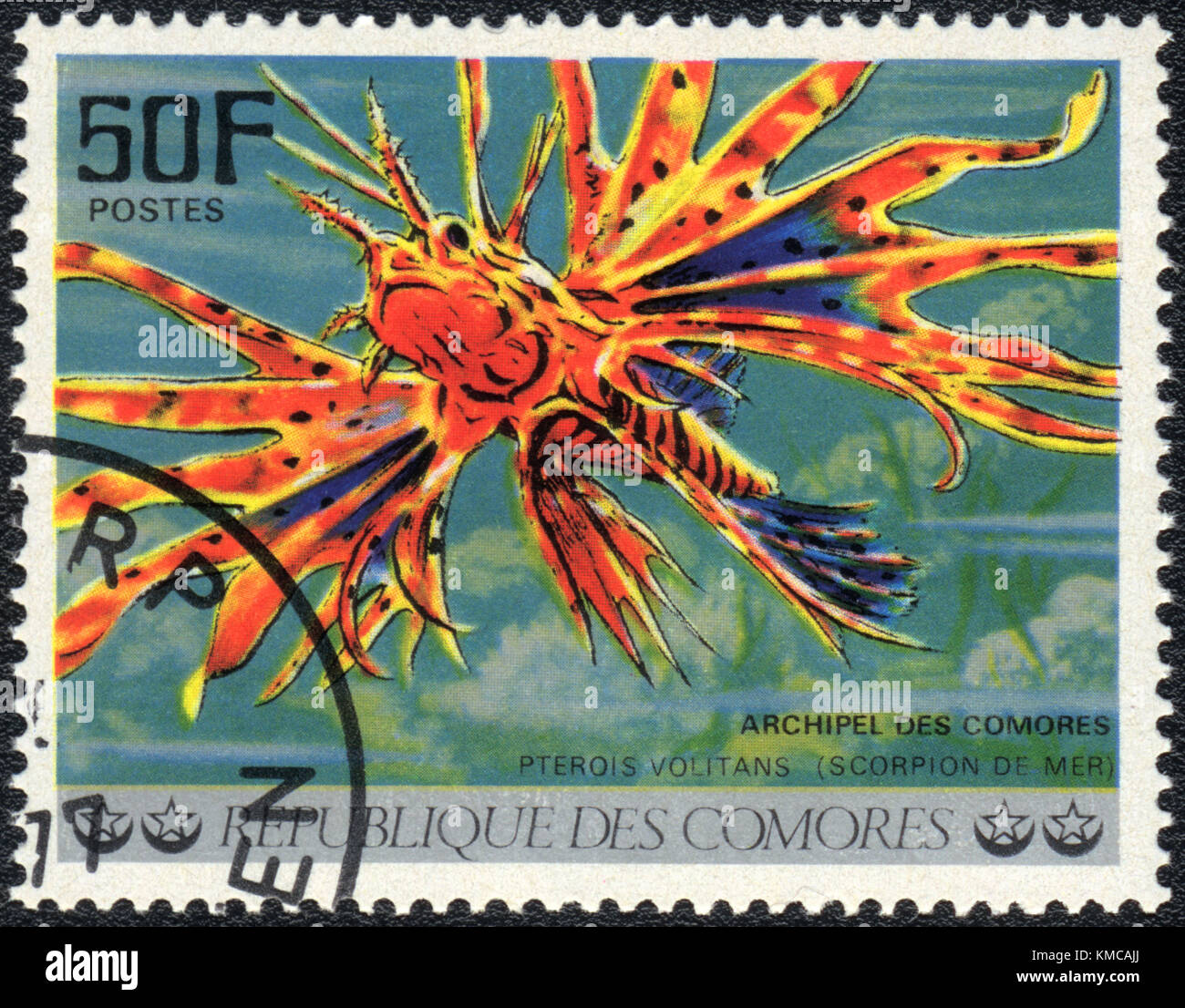 A stamp printed in COMOROS shows  a Red lionfish (Pterois volitans), series 'Tropical Fishes', circa 1977 Stock Photo