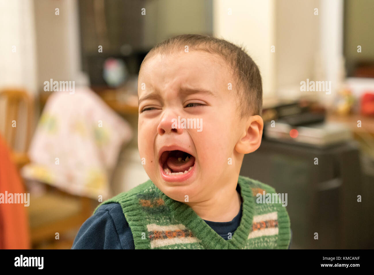 Baby boy loudly cries Stock Photo Alamy