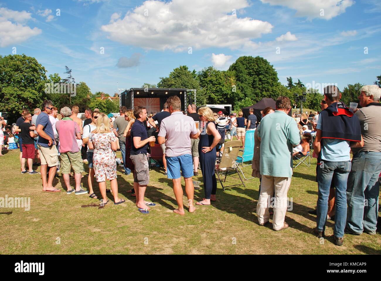 People enjoying the annual Tentertainment music festival at Tenterden in Kent, England on July 2, 2017. The free event was first held in 2008. Stock Photo