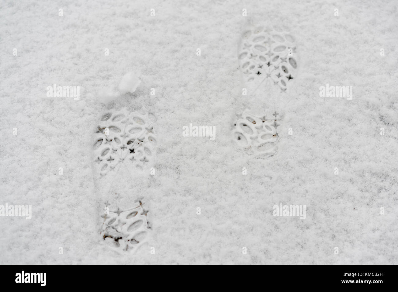 female footprints in the snow Stock Photo Alamy