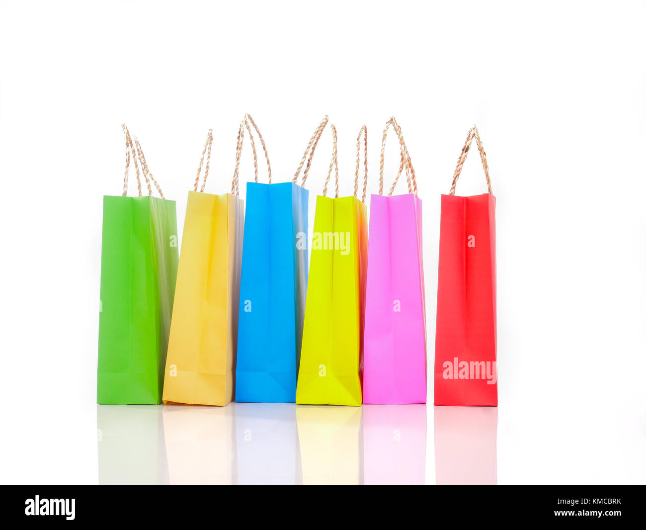 Colourful paper shopping bags on white background for use us shopping concept Stock Photo