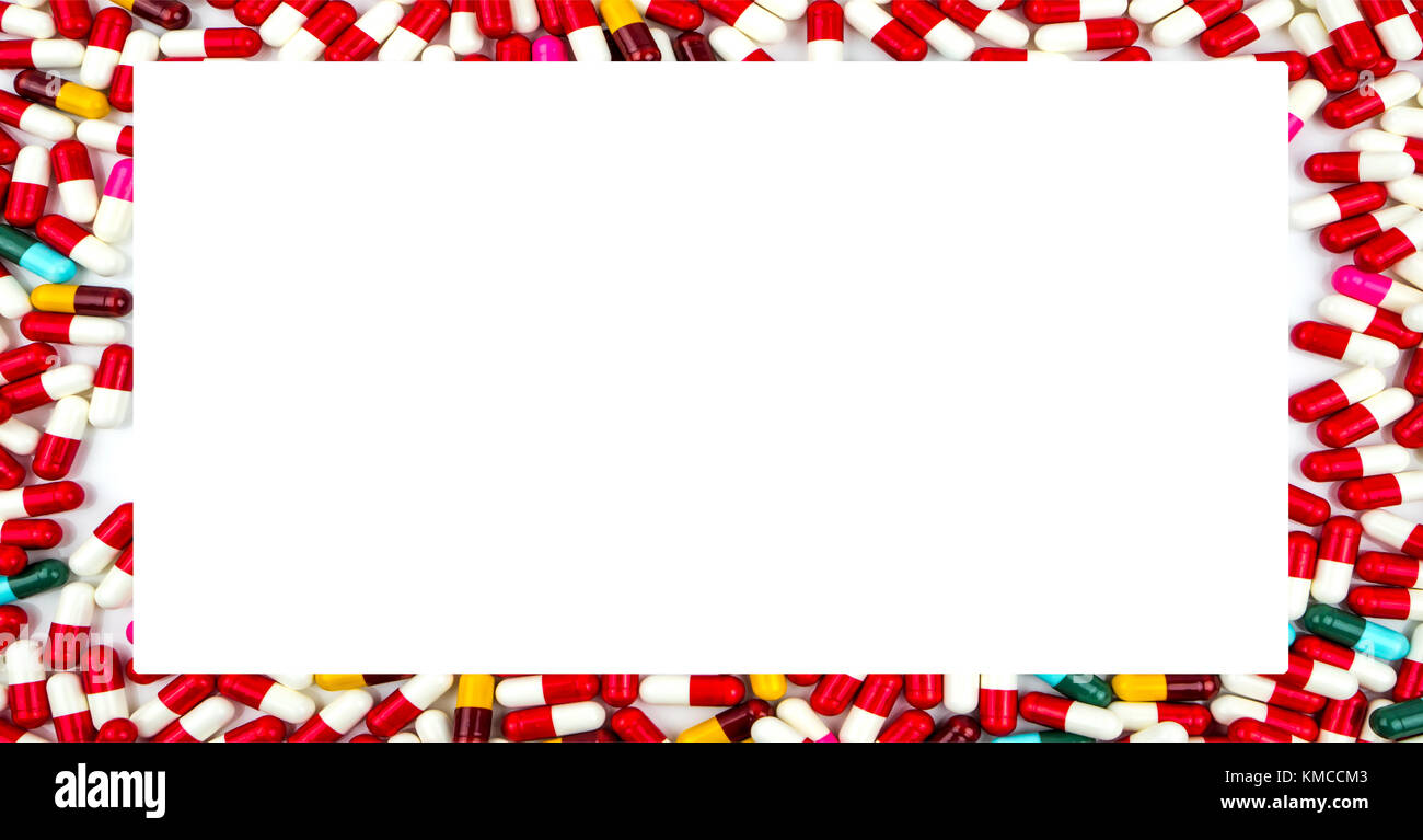 Colorful of antibiotics capsule pills rectangle frame on white