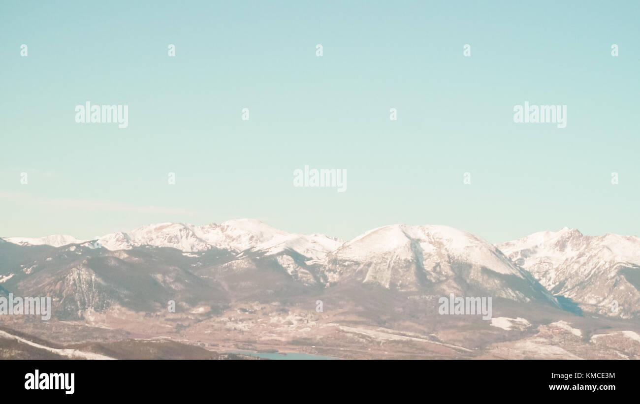 View of the mountain peaks covered with snow Stock Photo - Alamy