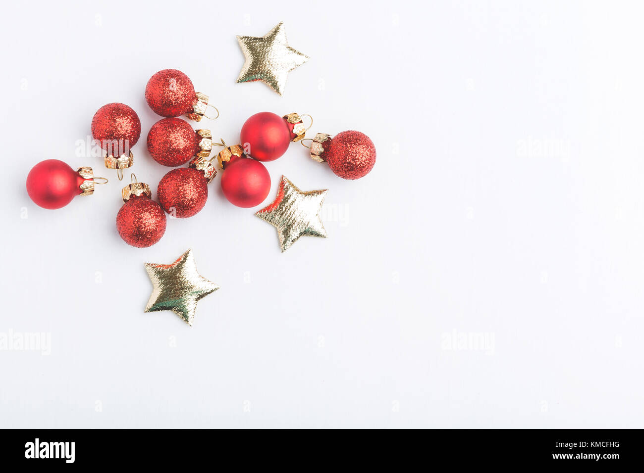 Red christmas baubles on white background Stock Photo - Alamy