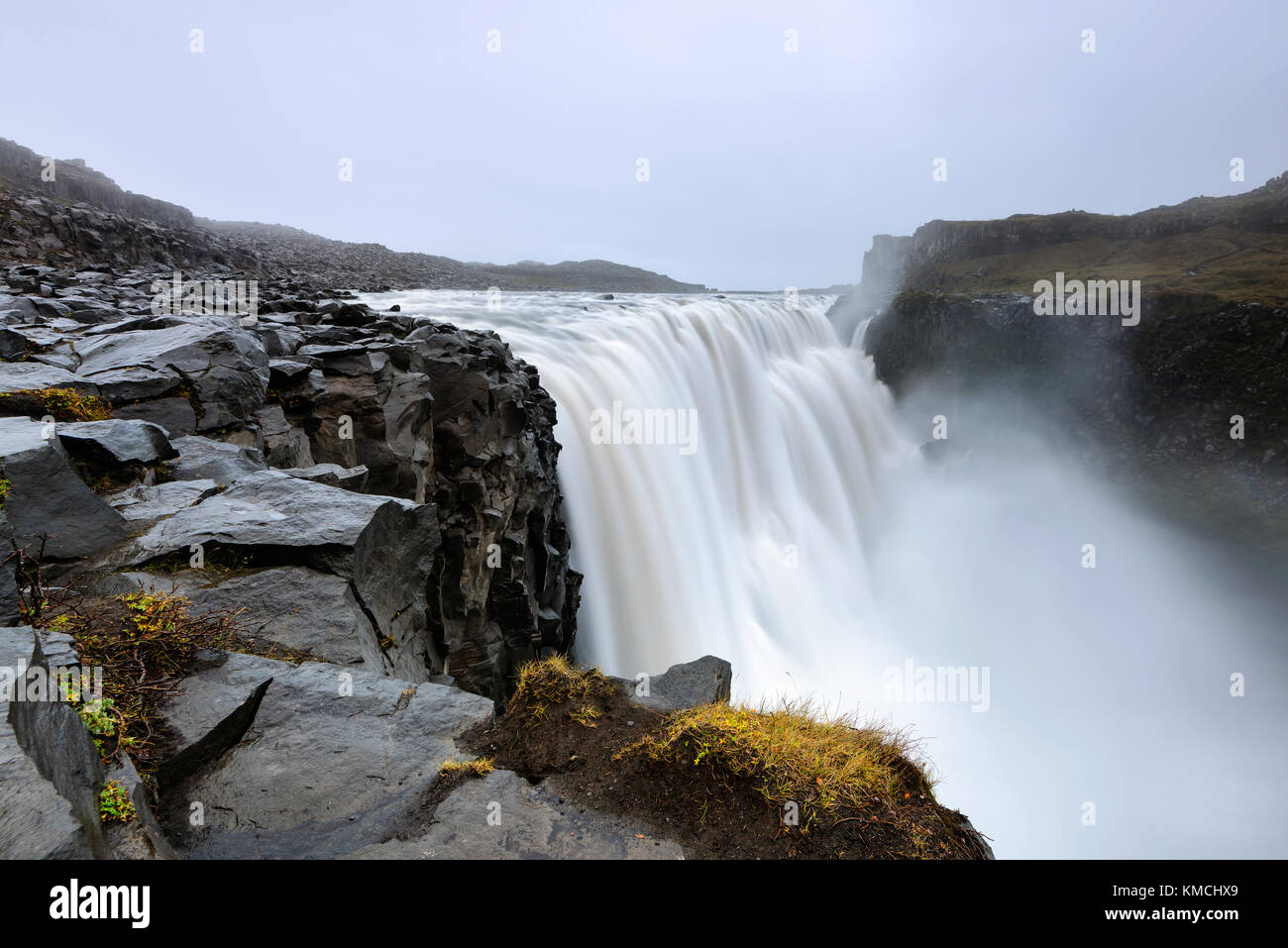 Dettifoss is a waterfall in Vatnajokull National Park in Iceland, and is the most powerful waterfall in Europe. Amazing landscape at sunrise. Stock Photo