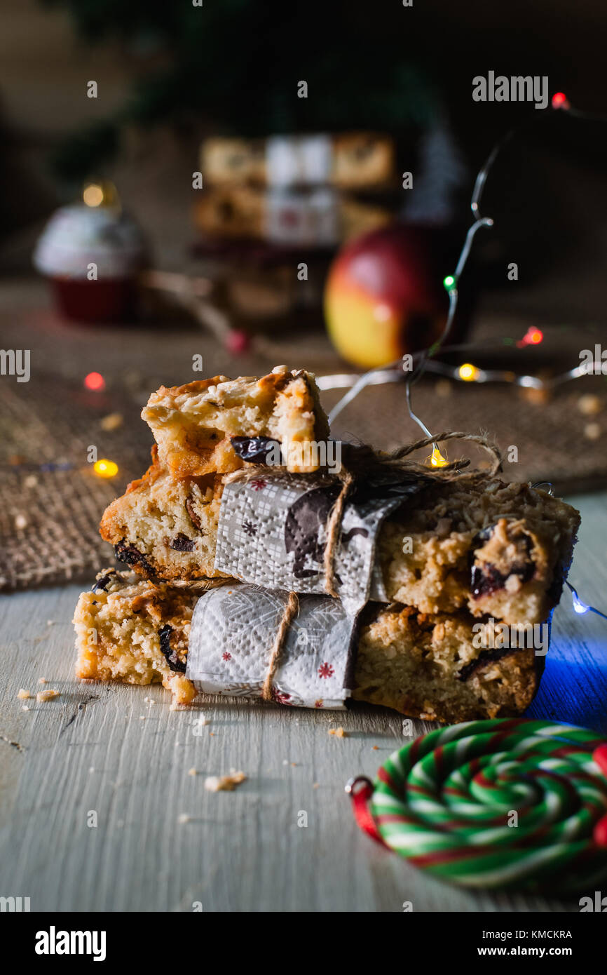 Christmas cookies, red apples, and lights Stock Photo