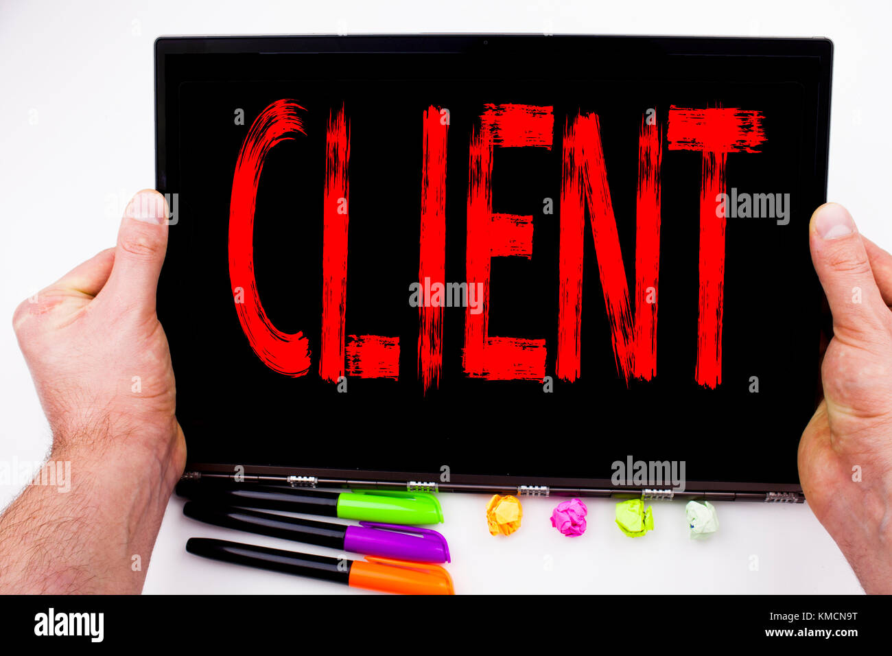 Client text written on tablet, computer in the office with marker, pen ...