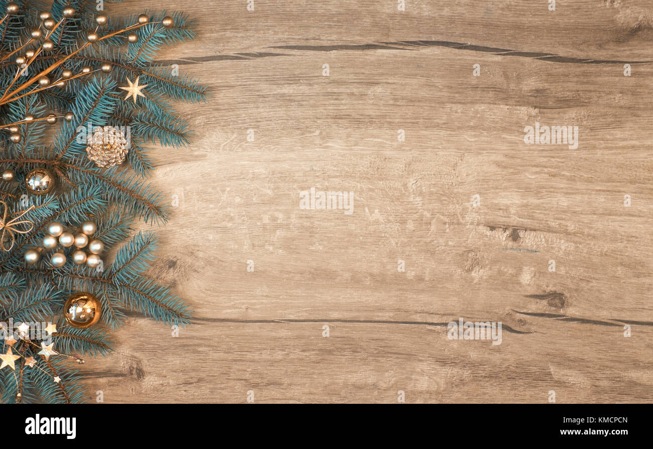 Christmas background with decorated fir tree branch border on wood. Top ...