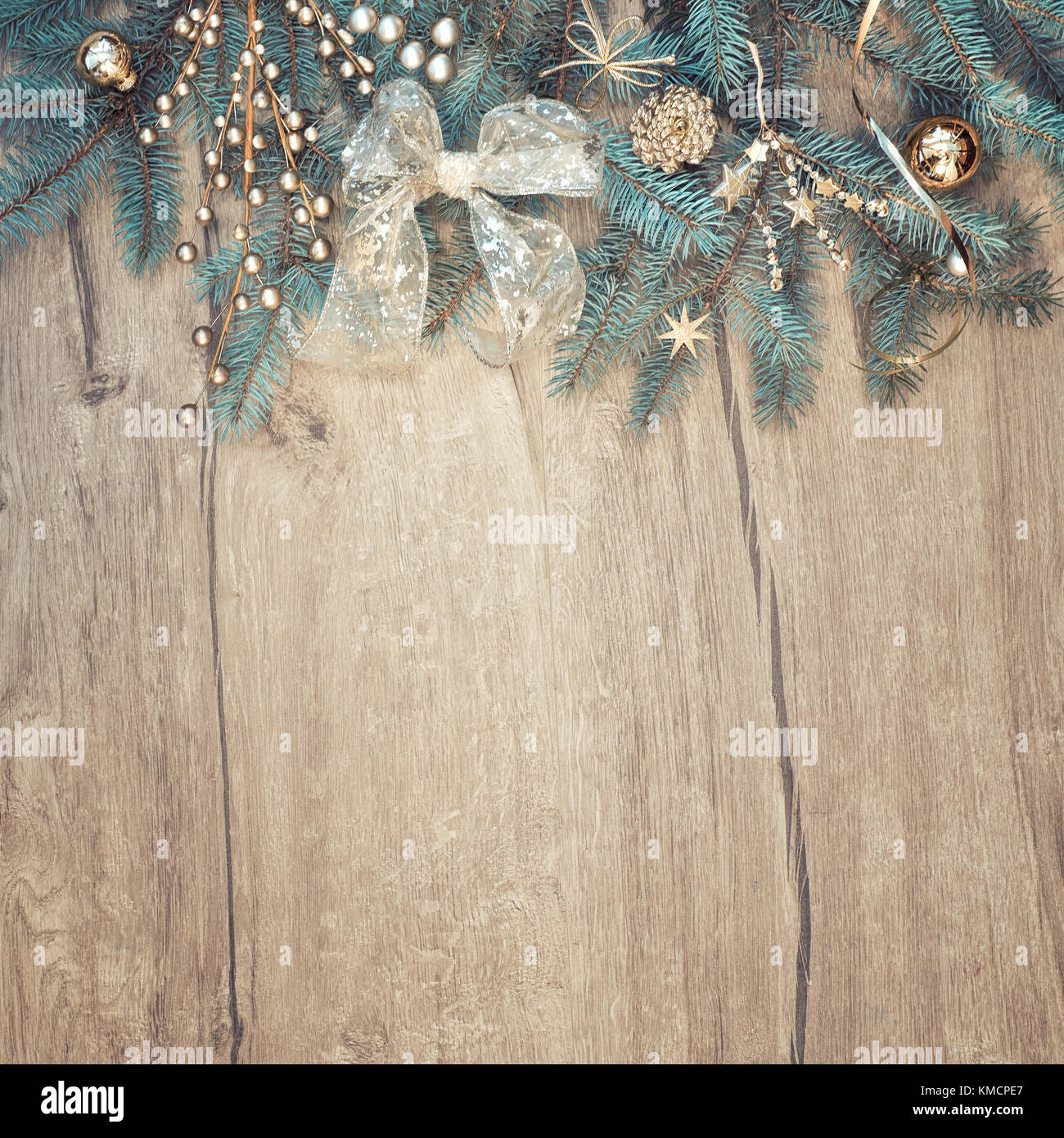 Christmas background with decorated fir tree branch border on wood. Top ...