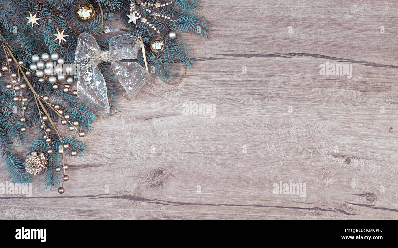 Christmas background with decorated fir tree branch border on wood. Top ...