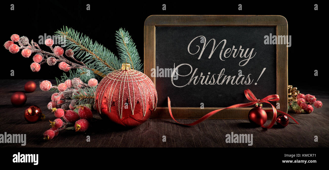 Blackboard With Text Space Surrounded By Christmas Decorations On