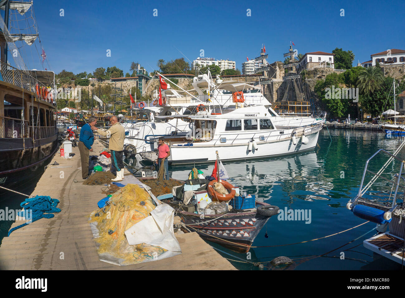 Fishermen at the harbour, old town Kaleici, Antalya, turkish riviera, Turkey Stock Photo