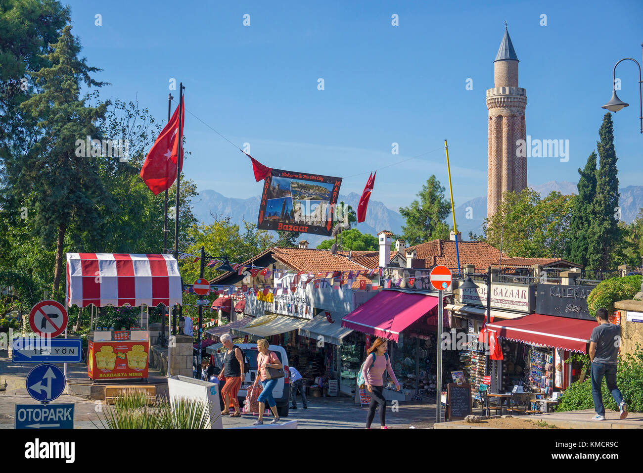 Bazaar, Souvenir shops and Yivli Minaret at Kaleici, the old town of Antalya, turkish riviera, Turkey Stock Photo