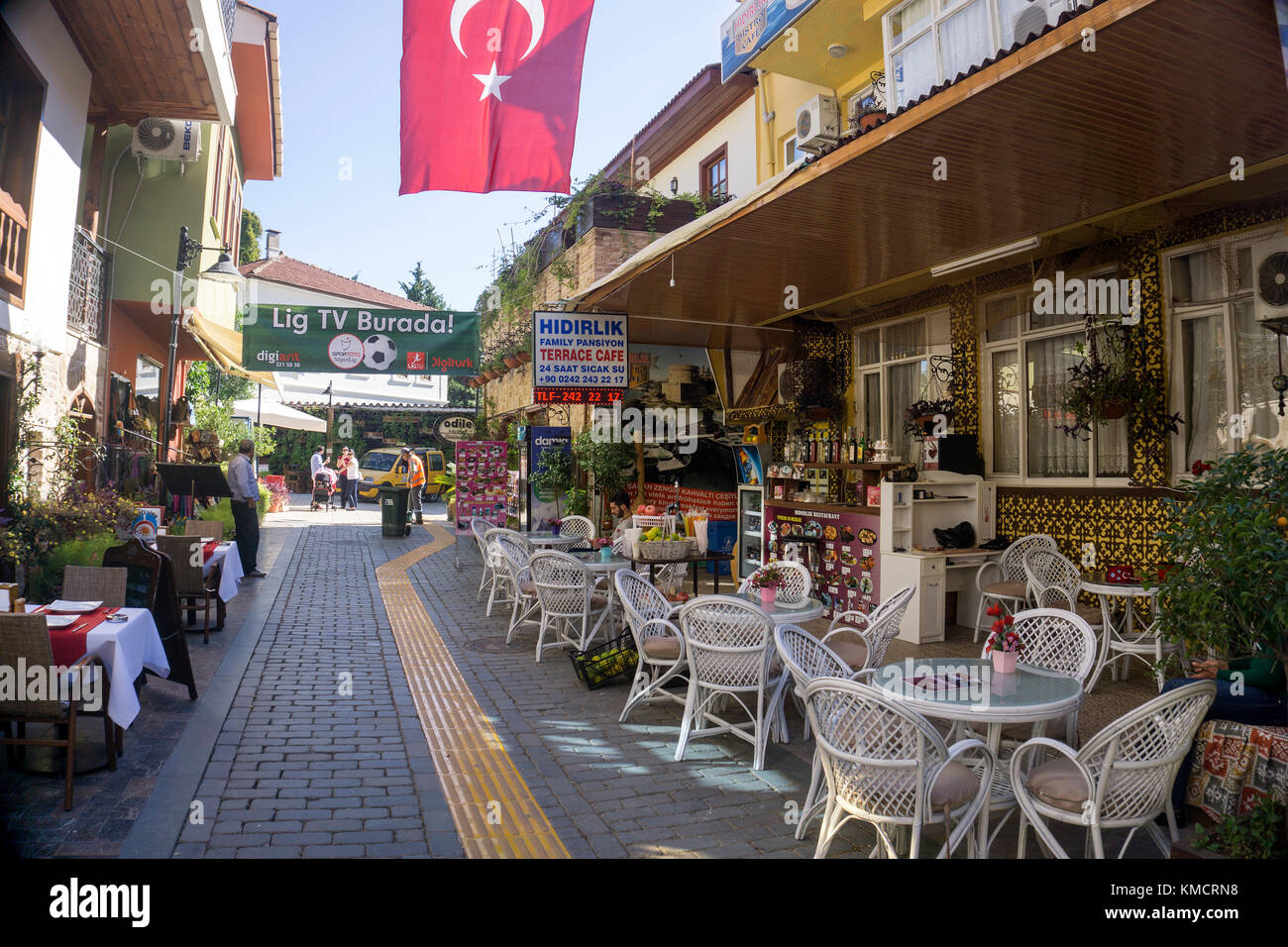 Outside gastronomy at a small alley of Kaleici, the old town of Antalya, turkish riviera, Turkey Stock Photo