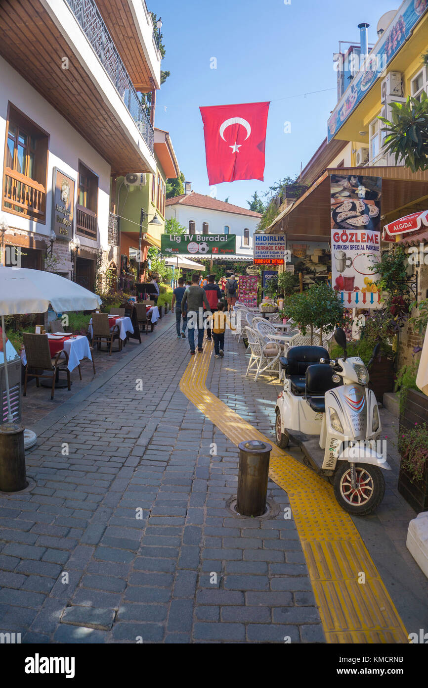 Outside gastronomy at a small alley of Kaleici, the old town of Antalya, turkish riviera, Turkey Stock Photo