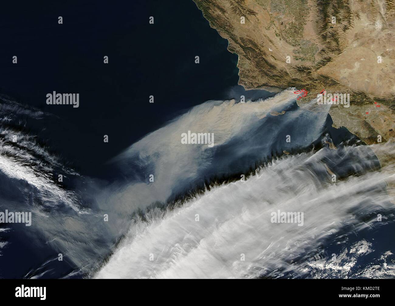 California, USA. 06th Dec, 2017. Smoke from massive forest fires burning in Southern California fueled by Santa Ana winds can be seen from space December 6, 2017 in Earth Orbit. Thousands of residents were forced to evacuate when the Thomas Fire suddenly pushed into Ventura by 70 mph winds. Credit: Planetpix/Alamy Live News Stock Photo