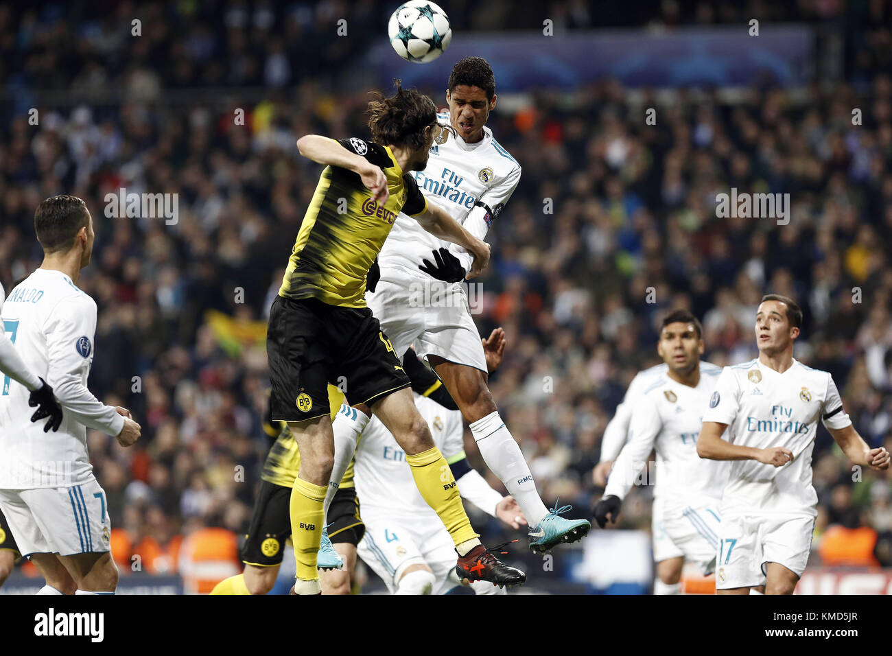 Madrid, Spain. 6th Dec, 2017. Raphael Varane of Real Madrid and Subotic of Borussia Dortmund all battle to win a header during the UEFA Champions League group H match between Real Madrid and Borussia Dortmund at Estadio Santiago Bernabeu. Credit: Manu reino/SOPA/ZUMA Wire/Alamy Live News Stock Photo