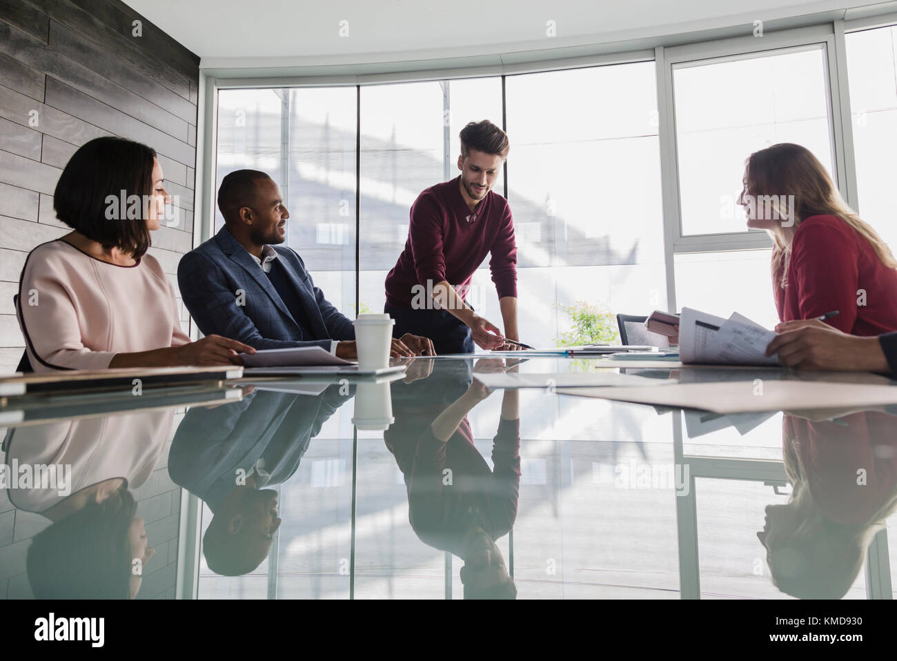 Businessman leading conference room meeting Stock Photo Alamy