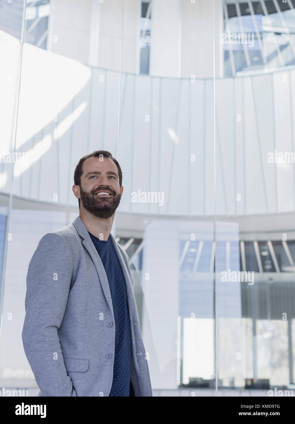 Portrait smiling,confident businessman in office atrium Stock Photo