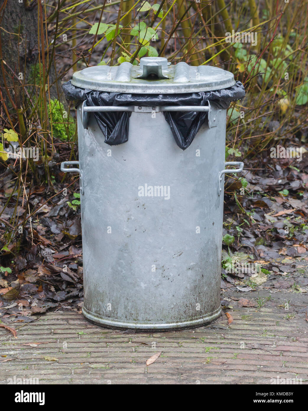 Metal rubbish bin in a park the Netherlands Stock Photo Alamy