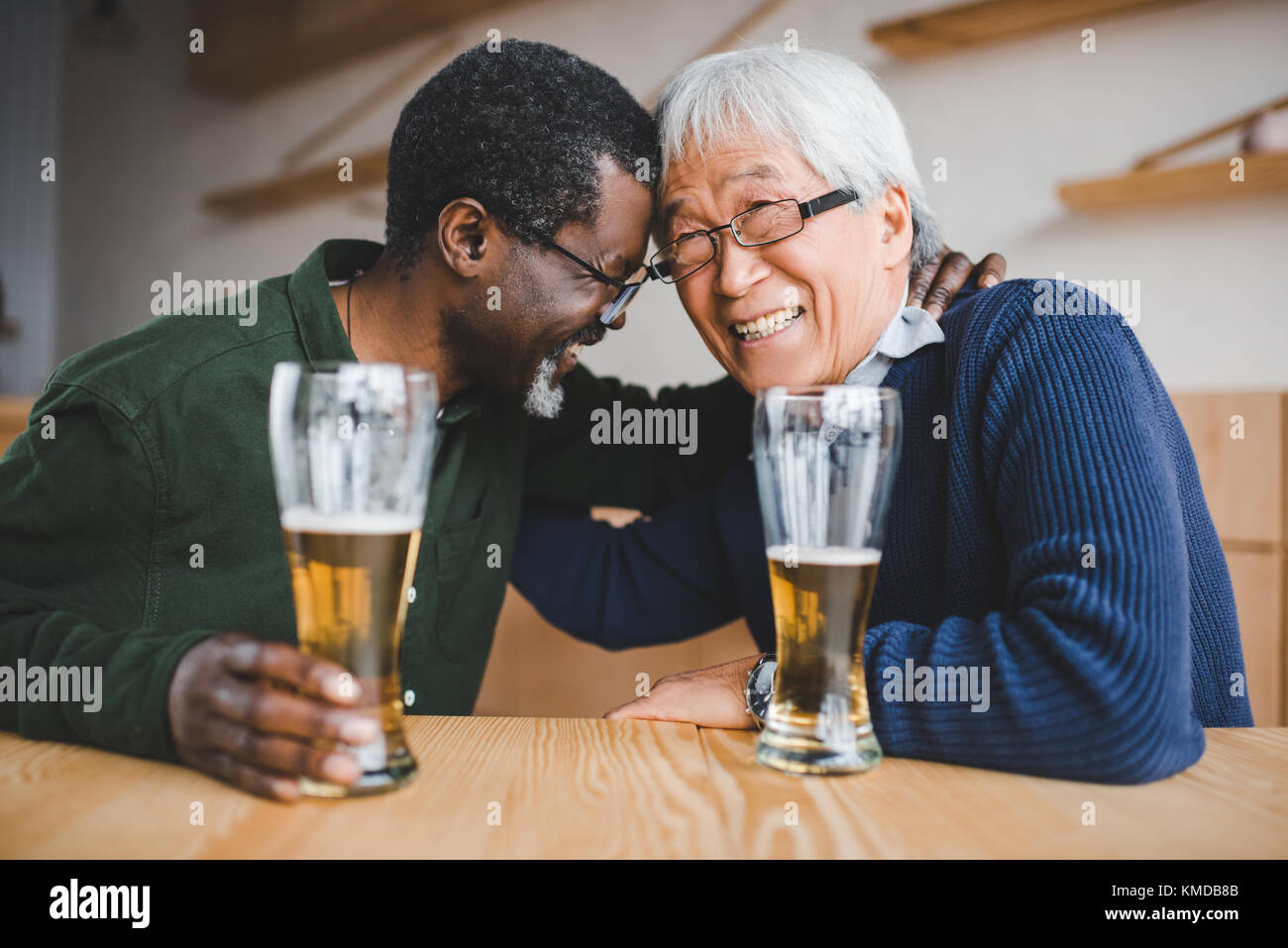 senior friends drinking beer Stock Photo