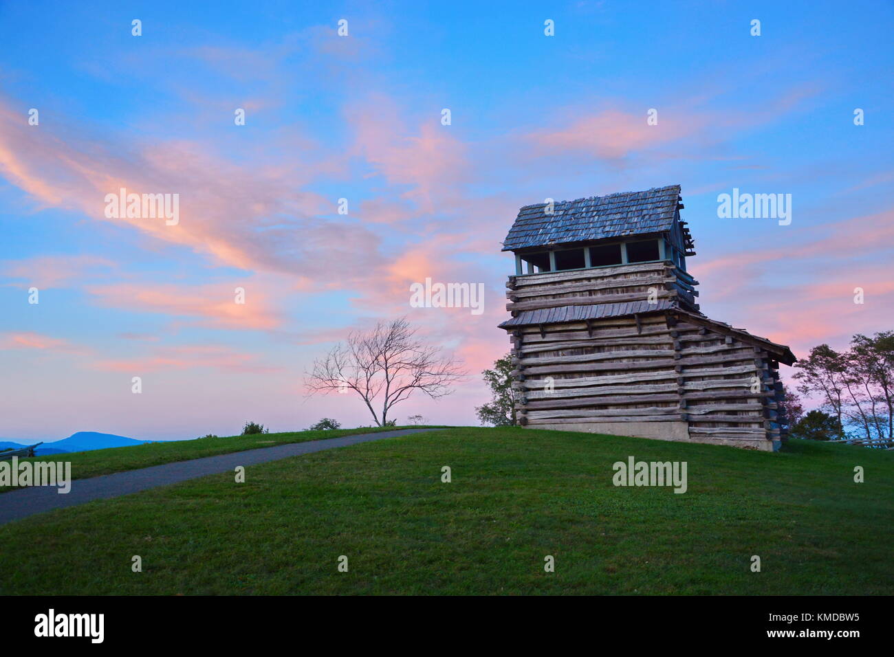 The Groundhog Mountain Observation Tower cloaked in the colors of a crisp Autumn sunset. Stock Photo