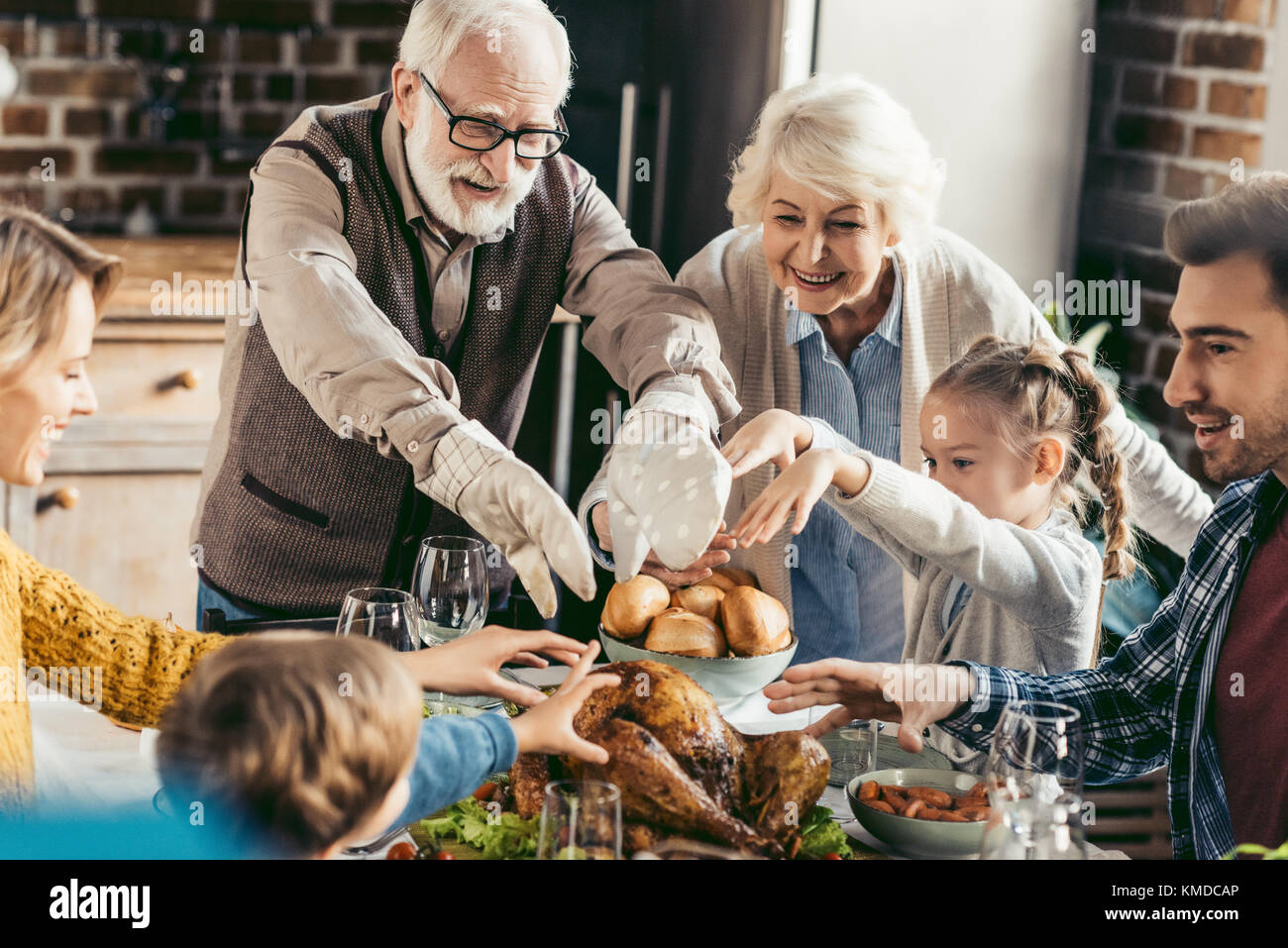 family having holiday dinner Stock Photo - Alamy