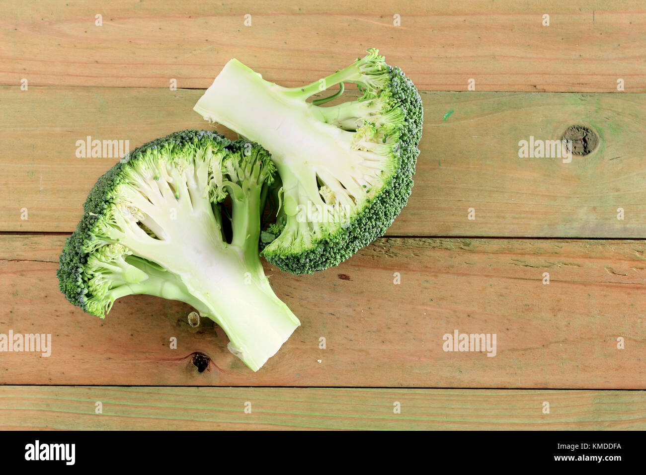 Broccoli on Wooden Background Stock Photo