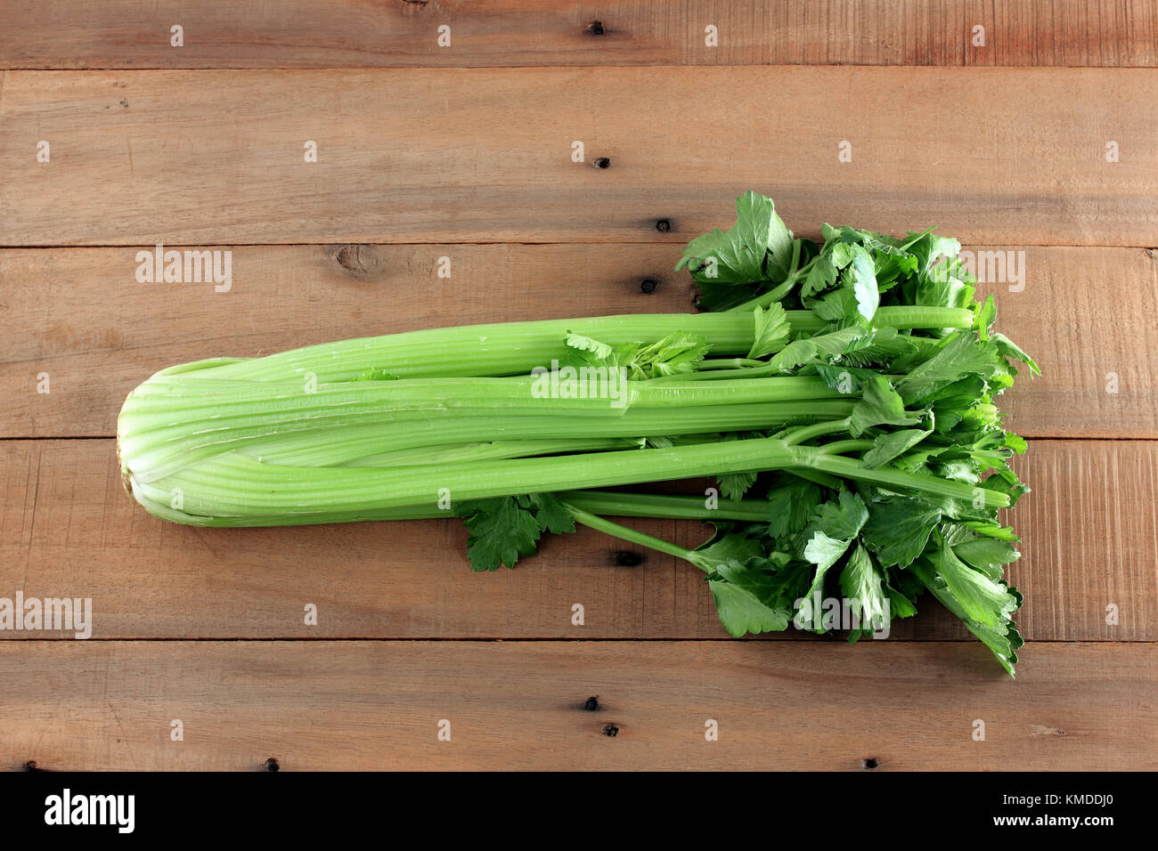 Bunch of Celery on Wooden Background Stock Photo Alamy