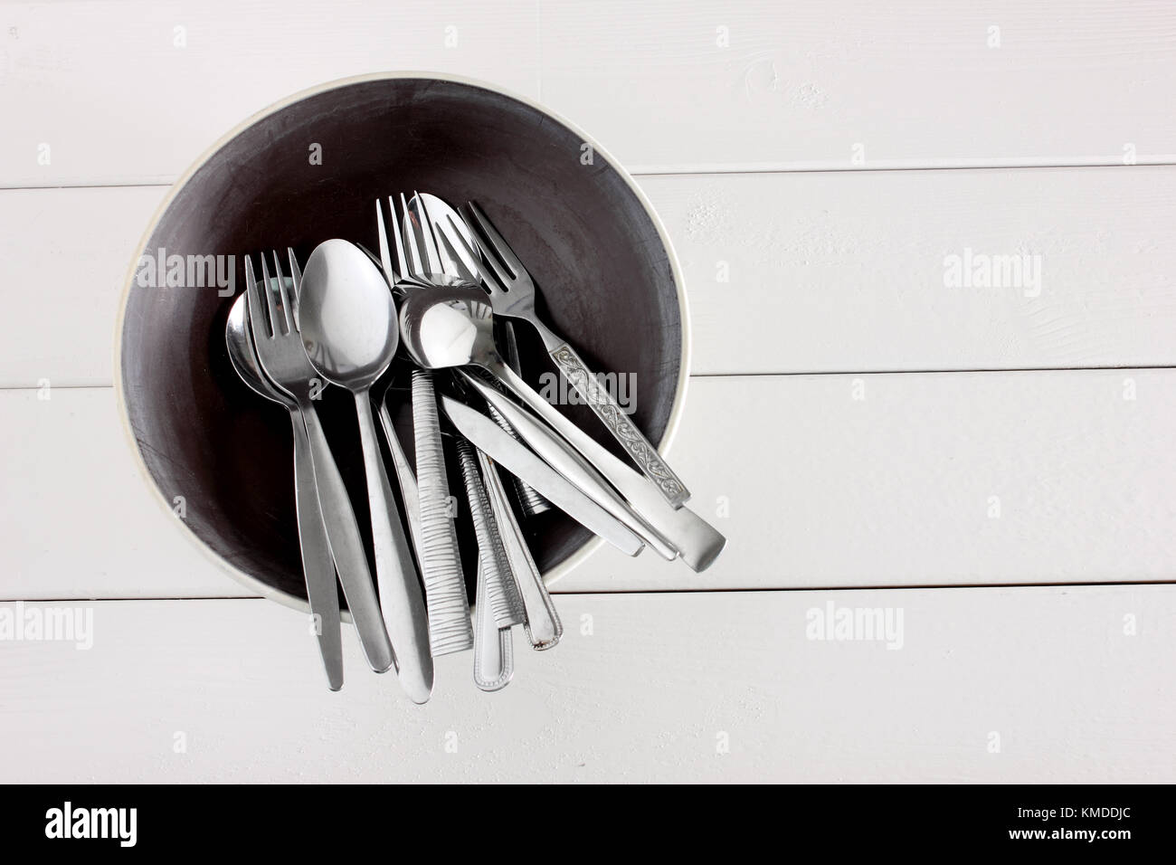 Forks and Spoons on Wooden Background Stock Photo