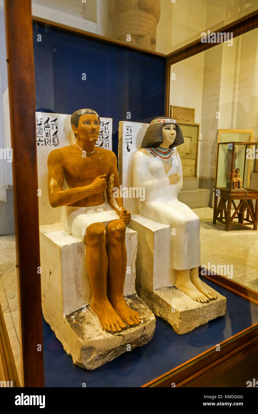 Ornate painted limestone figures of Rahotep and his wife Nofret in the Egyptian Museum, Cairo, Egypt, North Africa Stock Photo