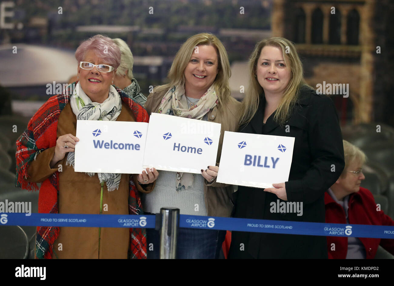 Family and friends await the arrival of Billy Irving from Connel, Argyll, one of the so-called Chennai Six, at Glasgow Airport after being released from India after serving four years in jail on weapons charges. Stock Photo