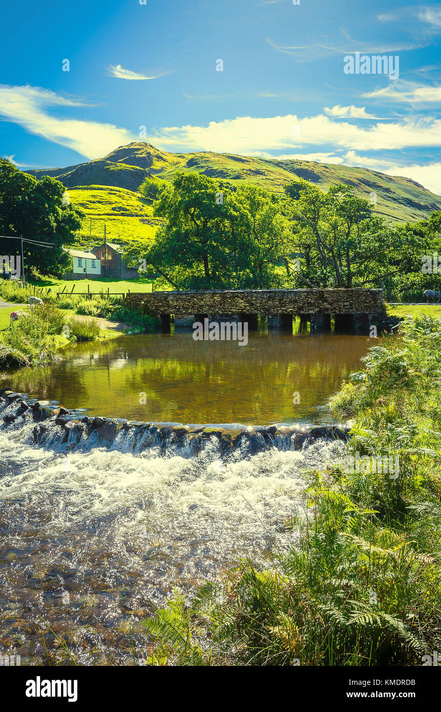 In the English Lake District with Martindale Beck and weir in summer UK Stock Photo