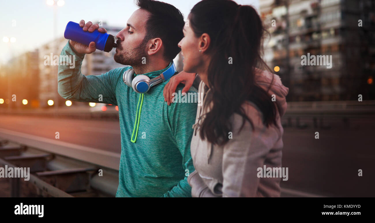 Happy young sporty couple sharing romantic moments Stock Photo - Alamy